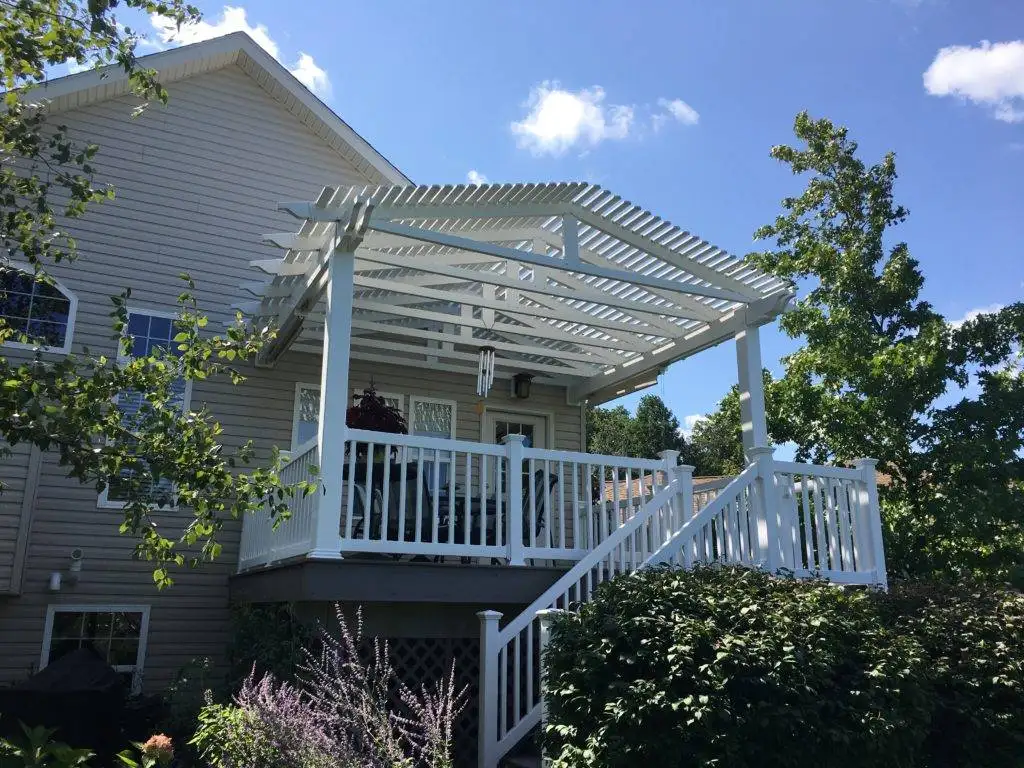 Custom Pergolas with Roofs in Cleveland, Akron & Medina 17 DreamDecks designs and builds architectural-grade outdoor living spaces across Northeast Ohio. From modern decks to full backyard sanctuaries, each project reflects craftsmanship, precision, and timeless luxury. Call 330-907-3040 or visit buildyourDreamDeck.com DreamDecks | Premier Deck Builder & Outdoor Architecture Custom pergola with a roof over an outdoor living space in Northeast Ohio, featuring quality wood and modern design.