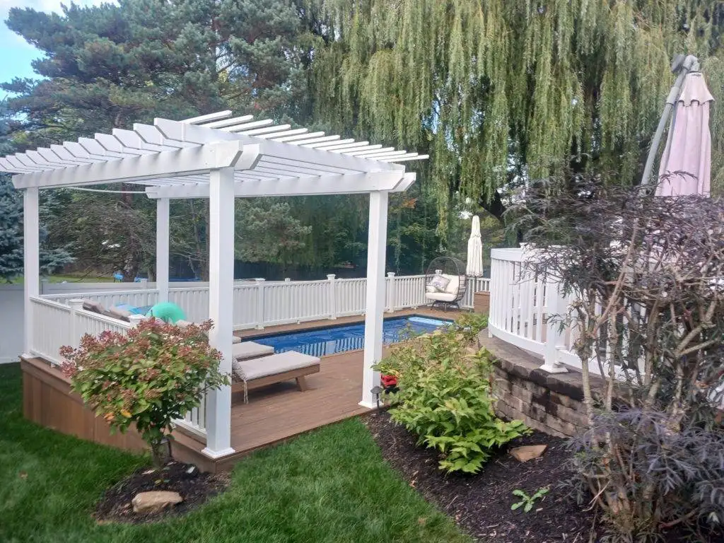 Custom Deck Builder in Macedonia, OH | DreamDecks Outdoor Living 13 DreamDecks designs and builds architectural-grade outdoor living spaces across Northeast Ohio. From modern decks to full backyard sanctuaries, each project reflects craftsmanship, precision, and timeless luxury. Call 330-907-3040 or visit buildyourDreamDeck.com DreamDecks | Premier Deck Builder & Outdoor Architecture Custom wooden deck with modern railing and seating area in a backyard setting in Macedonia, OH by DreamDecks