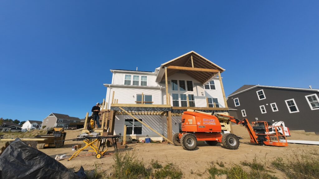 The roof framing takes shape over the upper deck