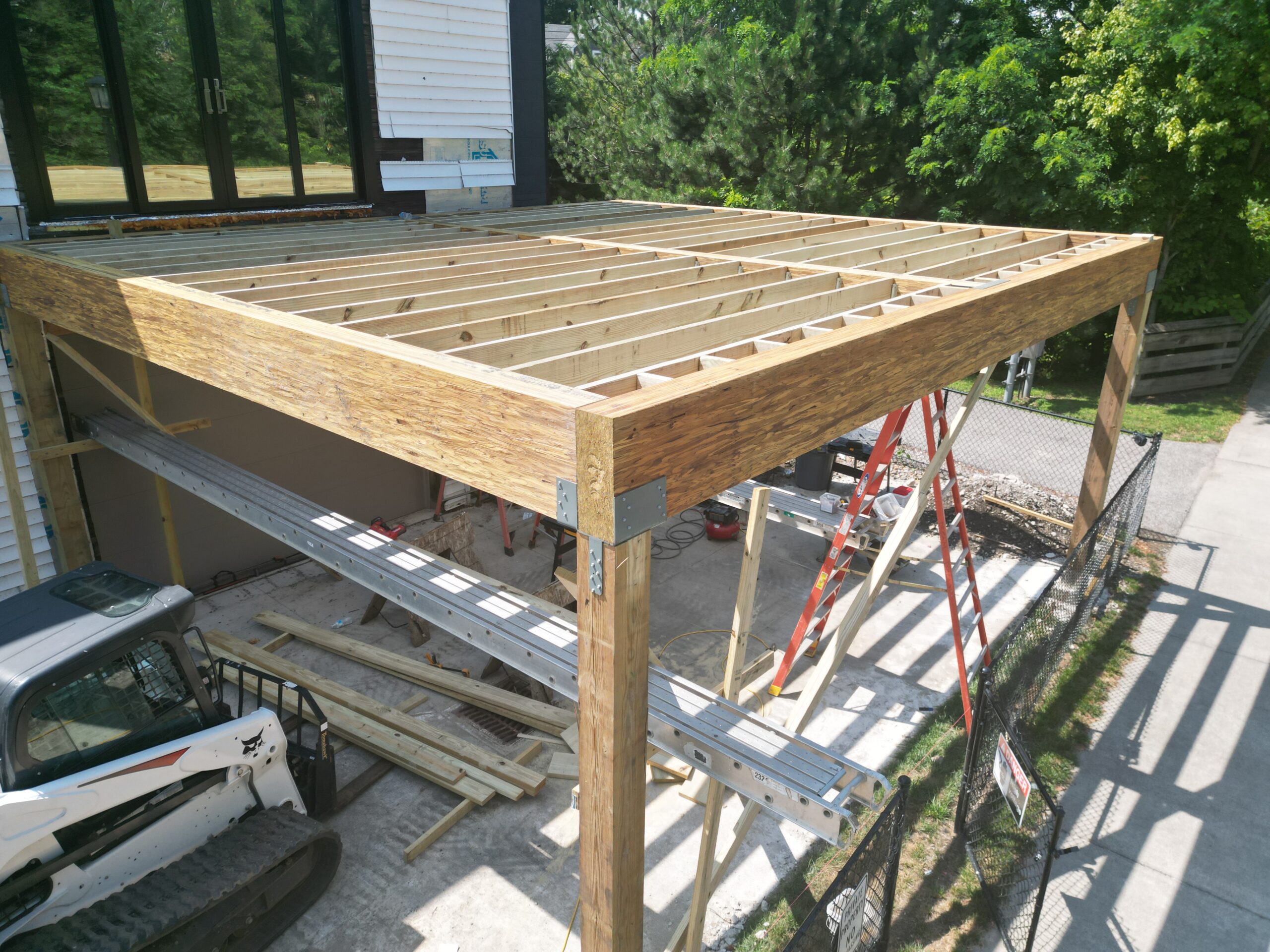 Durable Structural Decks in Northeast Ohio | DreamDecks 1 DreamDecks designs and builds architectural-grade outdoor living spaces across Northeast Ohio. From modern decks to full backyard sanctuaries, each project reflects craftsmanship, precision, and timeless luxury. Call 330-907-3040 or visit buildyourDreamDeck.com DreamDecks | Premier Deck Builder & Outdoor Architecture Spacious modern wooden deck with outdoor seating and pergola by DreamDecks in Northeast Ohio