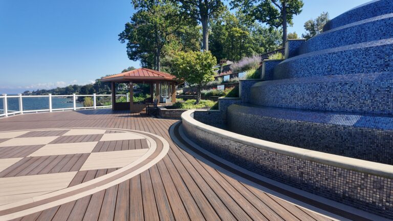 Curved composite deck edge with a patterned inlay by DreamDecks