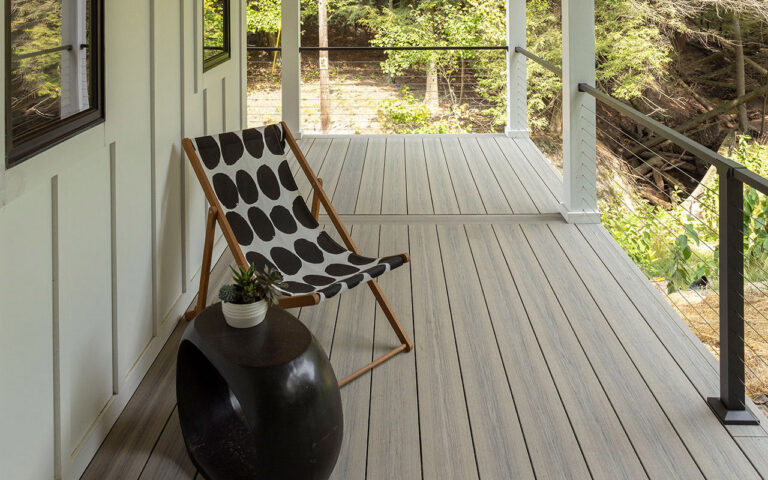 deckorators voyage tundra lake house porch DreamDecks designs and builds architectural-grade outdoor living spaces across Northeast Ohio. From modern decks to full backyard sanctuaries, each project reflects craftsmanship, precision, and timeless luxury. Call 330-907-3040 or visit buildyourDreamDeck.com DreamDecks | Premier Deck Builder & Outdoor Architecture