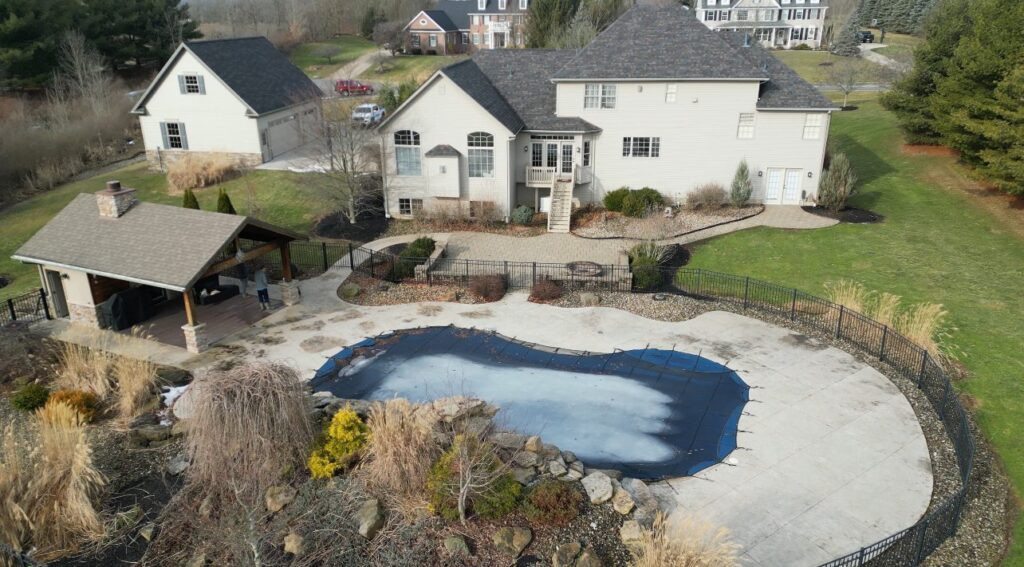 3D deck design rendering and the finished deck built by DreamDecks in Northeast Ohio