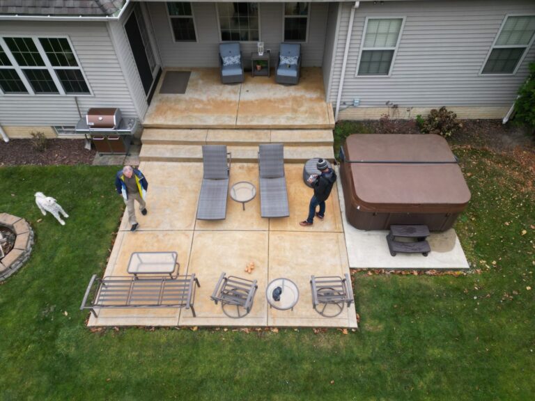 Old concrete patio before a DreamDecks deck makeover