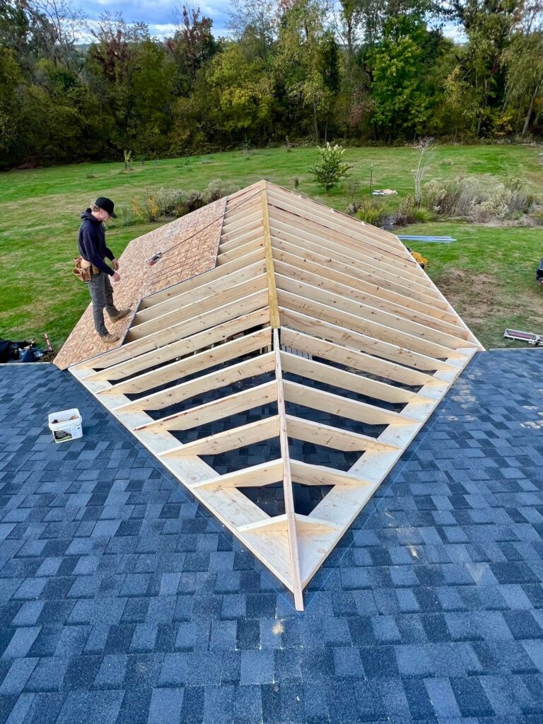 Covered porch and four season room addition framed and built by DreamDecks in Northeast Ohio