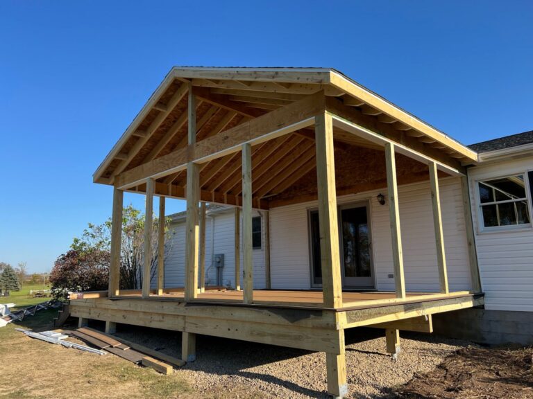 Covered porch and four season room addition framed and built by DreamDecks in Northeast Ohio