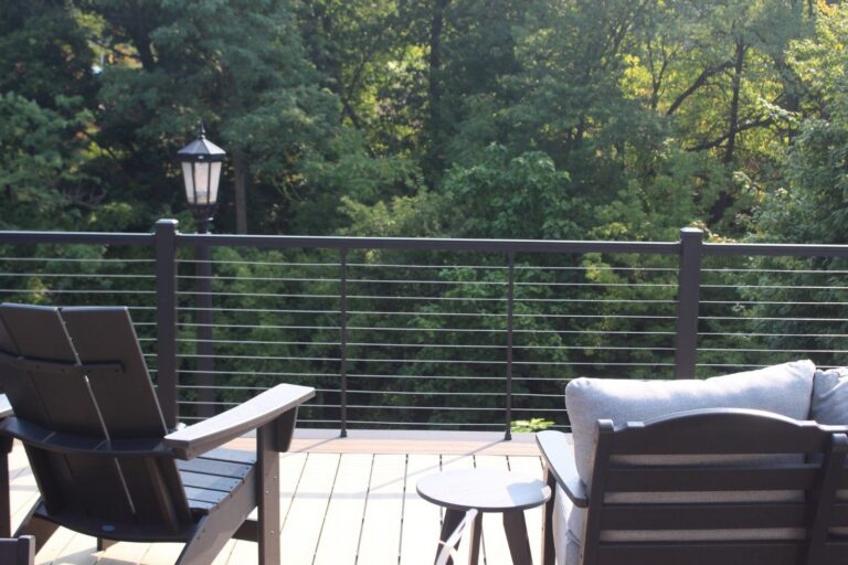 Elevated composite deck with black cable railing in Kent, Ohio by DreamDecks