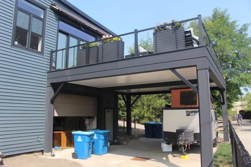 Elevated composite deck with black cable railing, built by DreamDecks in Kent, Ohio