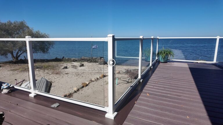 Lakefront deck with glass railing overlooking Lake Erie, built by DreamDecks in Northeast Ohio