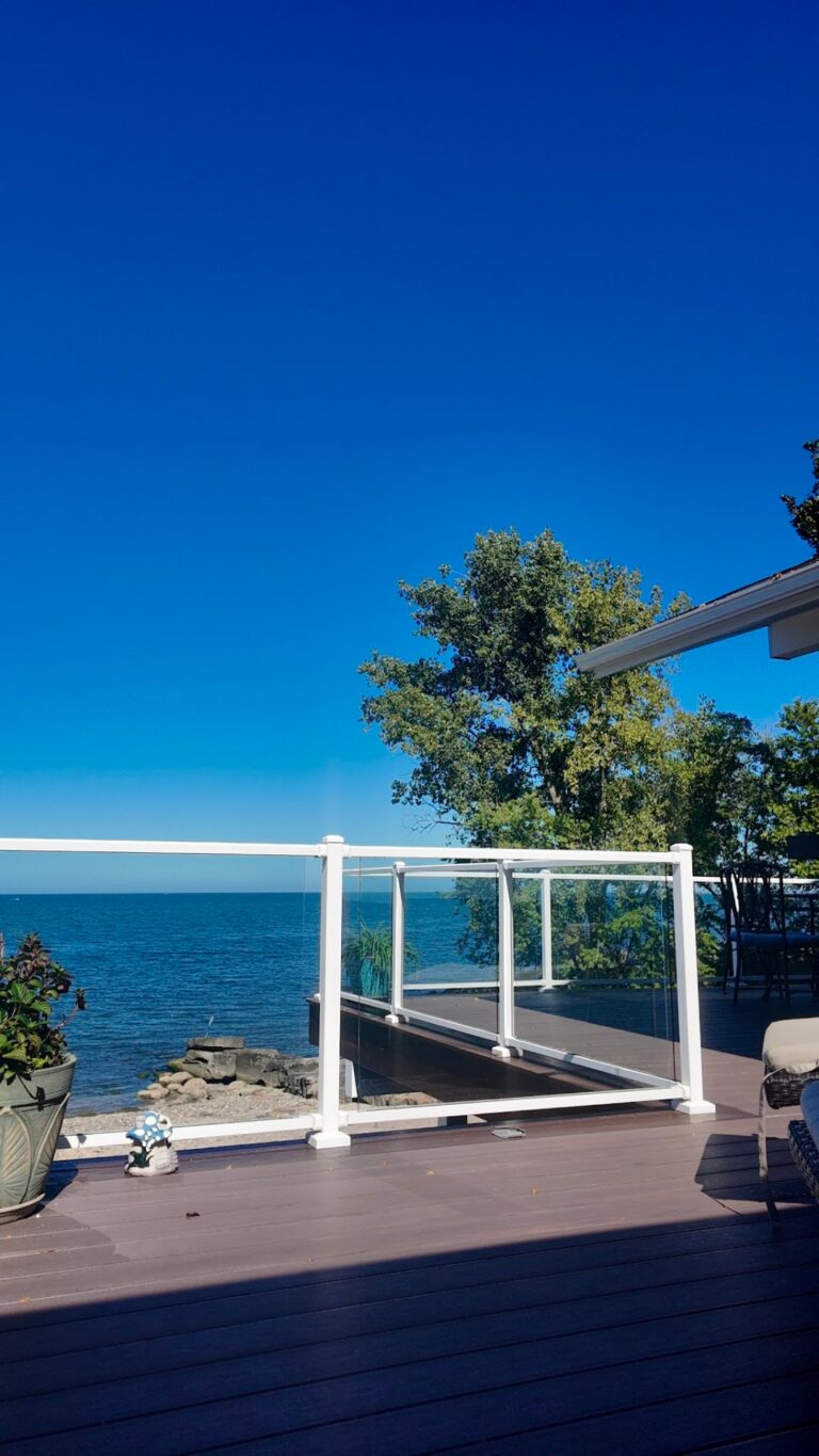 Lakefront deck with glass railing overlooking Lake Erie, built by DreamDecks in Northeast Ohio