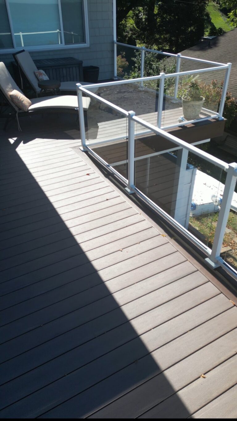 Lakefront deck with glass railing overlooking Lake Erie, built by DreamDecks in Northeast Ohio