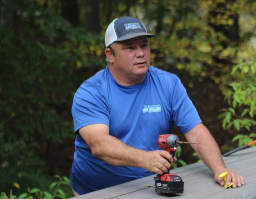 Mike, DreamDecks field foreman, installing composite decking