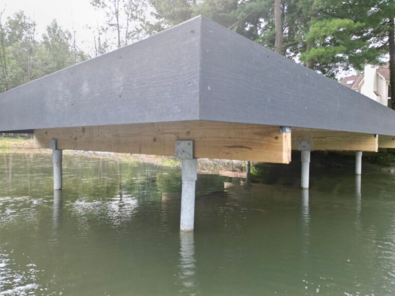 Composite pond dock and second story balcony deck built by DreamDecks in Northeast Ohio