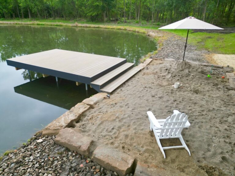 Composite pond dock and second story balcony deck built by DreamDecks in Northeast Ohio