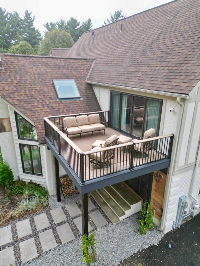Composite pond dock and second story balcony deck built by DreamDecks in Northeast Ohio