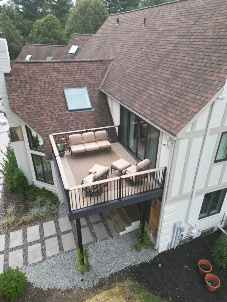 Composite pond dock and second story balcony deck built by DreamDecks in Northeast Ohio