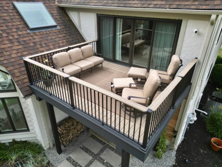 Composite pond dock and second story balcony deck built by DreamDecks in Northeast Ohio