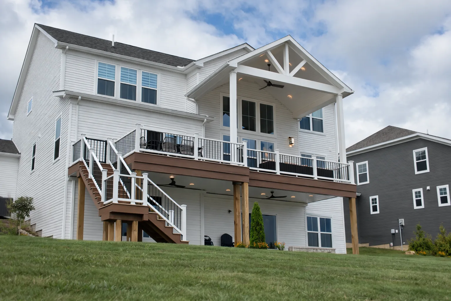 Finished two story DreamDecks deck with a cathedral roof
