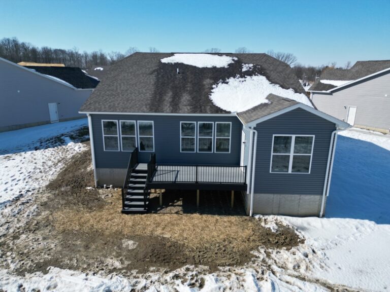 Winter deck build on a new construction home by DreamDecks
