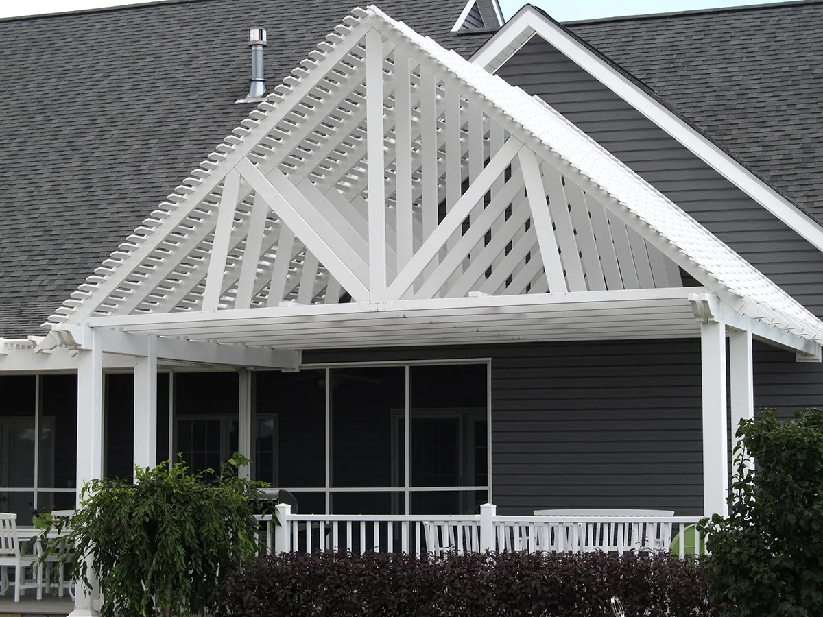DuraLux Genoa vinyl pergola over a backyard patio