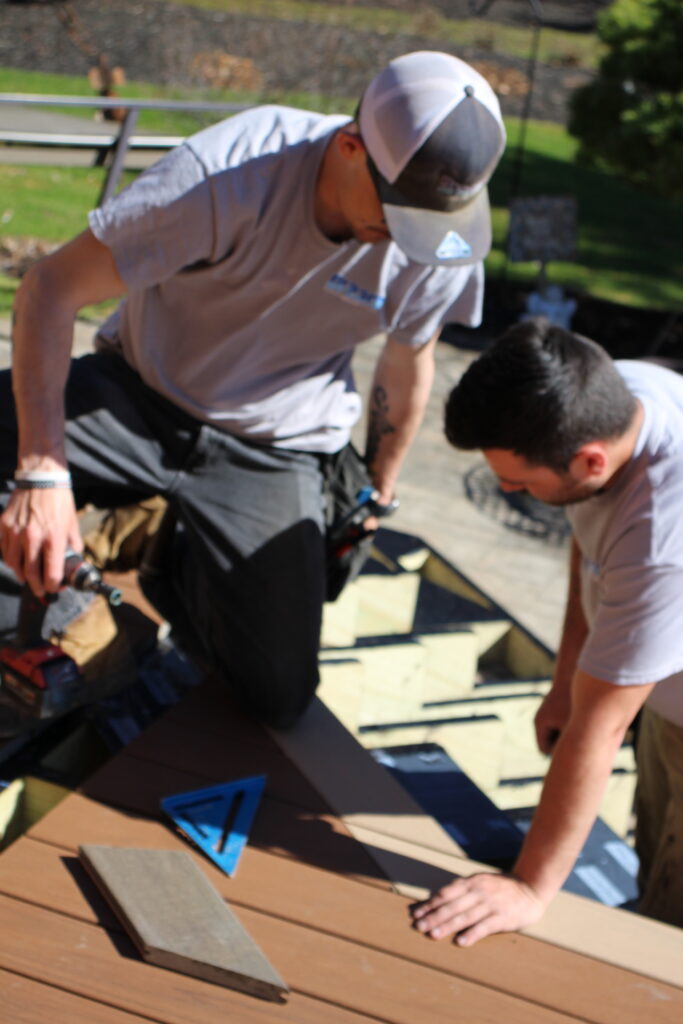 DreamDecks crew installing Trex Lineage Biscayne deck boards