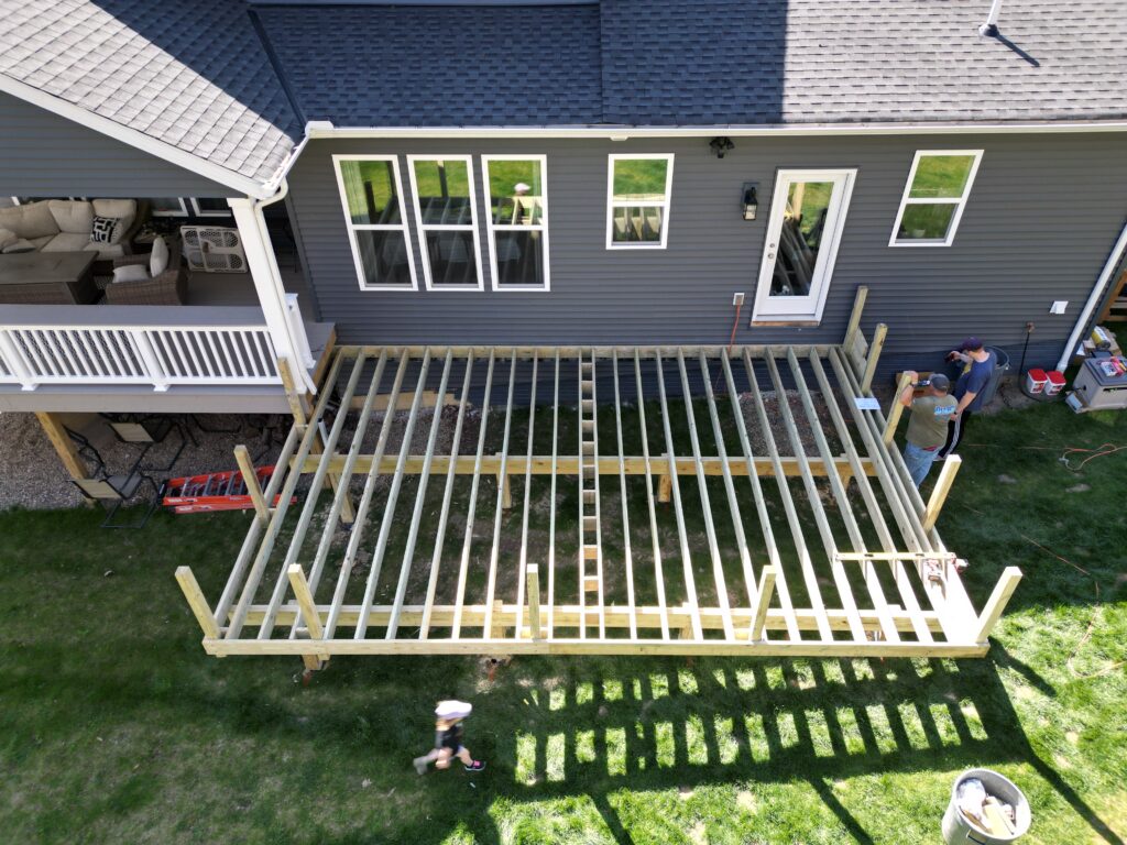 New lower deck framing on helical piers