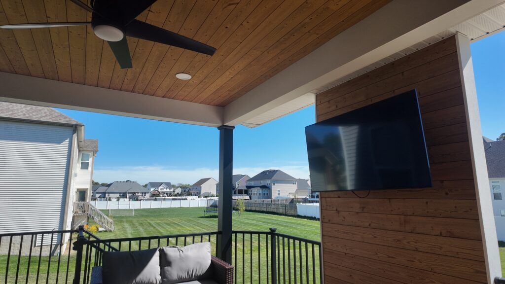 Wood TV accent wall under the new roof