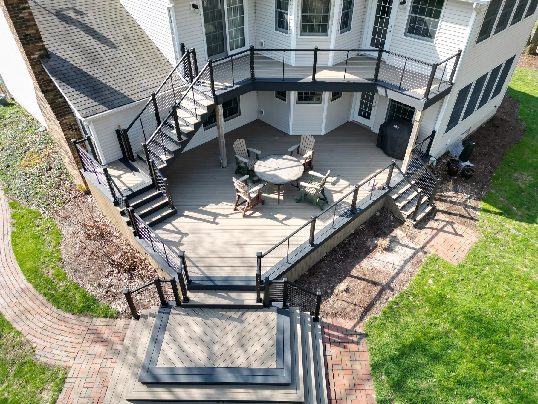Two level Deckorators Voyage deck resurface with KeyLink cable railing in Medina, Ohio by DreamDecks